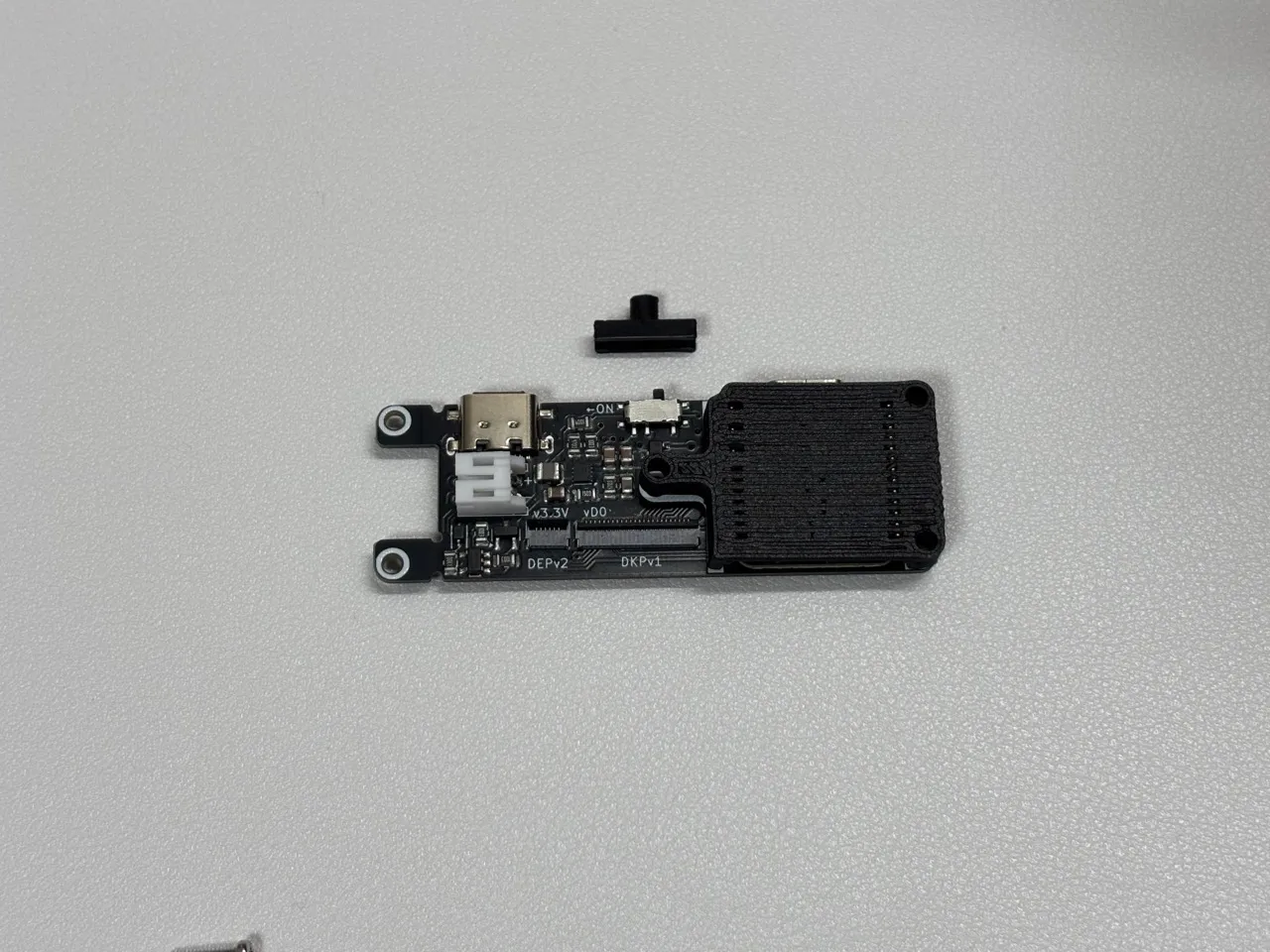 電源スイッチカバー(正面)